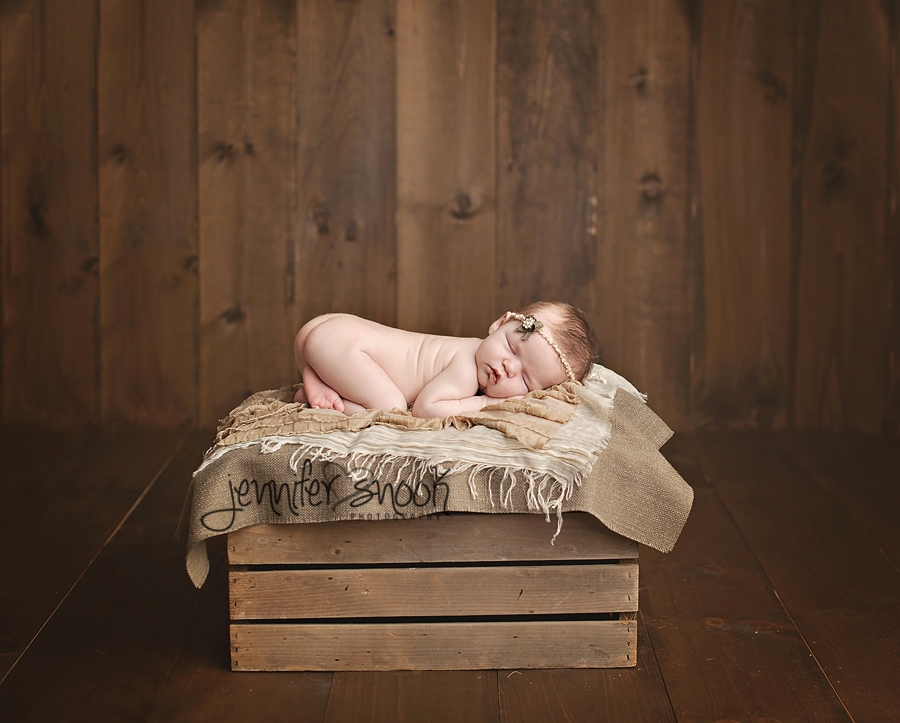 newborn baby on prop