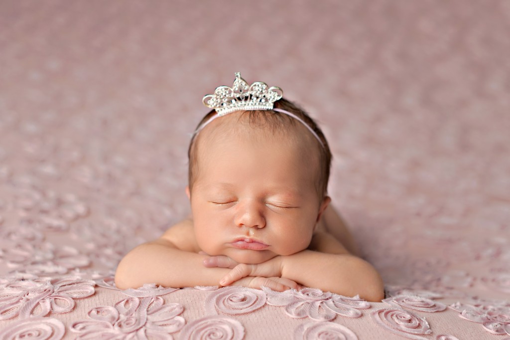 Newborn baby with tiara 