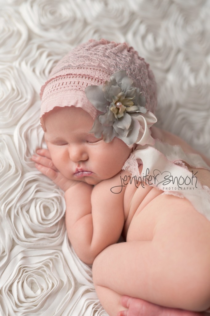 newborn in bonnet