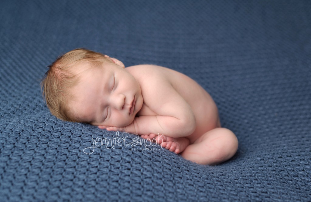 newborn curled up pose